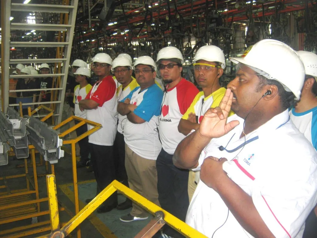 Club members listening attentively to the explanation of the plant by a TCMA personnel