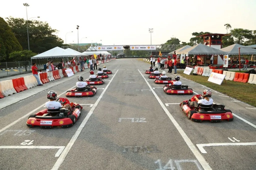 Shell Helix contestants ready to be flagged off in the go-kart challenge