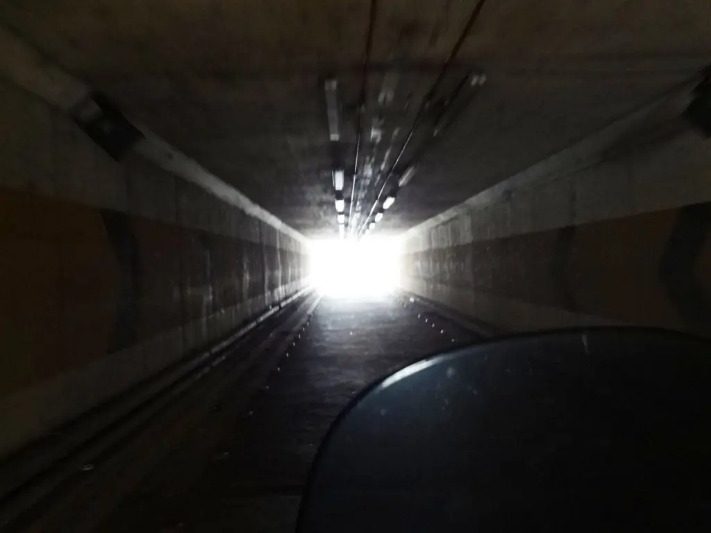 Little or no light, bikers are temporary blind after exiting into daylight