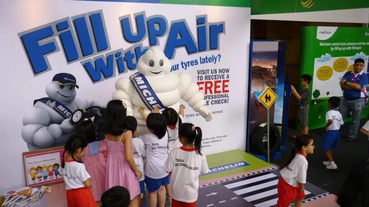 Children greeting the Michelin Man @ FUWA