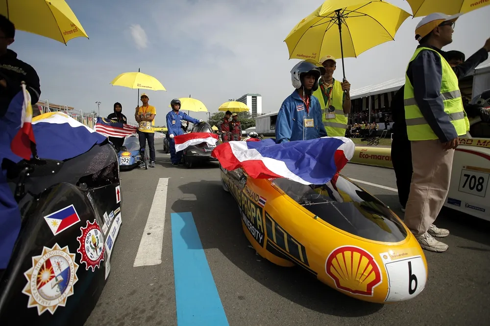 The Luk Jao Mae Khlong Prapa Ethnol, #6, a ethanol prototype vehicle from team Luk Jao Mae Khlong Prapa Ethnol at the Dhurakij Pubdit University in Laksi, Thailand, is seen on the starting line during day two of the Shell Eco-marathon Asia in Manila, Philippines, Friday, March 4, 2016. (Geloy Concepcion via AP Images)