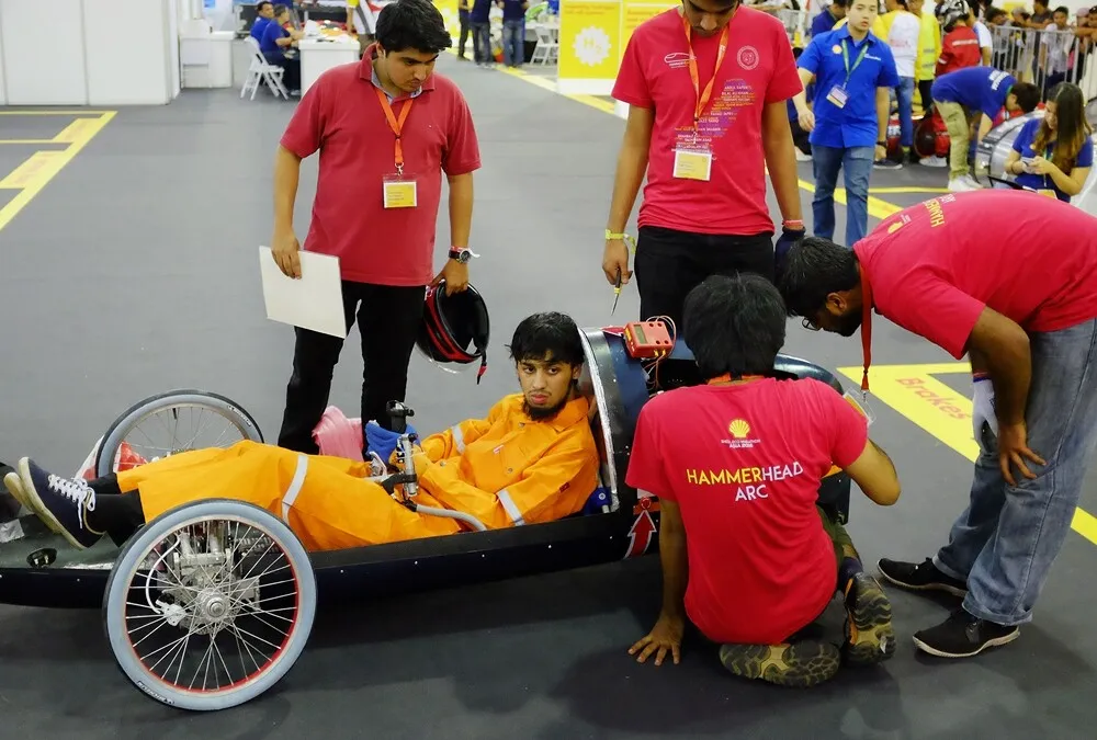 The ARC, #315, a battery electric prototype vehicle from team HammerHead ARC at the Ghulam Ishaq Khan Institute of Engineering Sciences and Technology in Topi, Pakistan, prepares for technical inspection during day three of the Shell Eco-marathon Asia, in Manila, Philippines, Saturday, March 5, 2016. (Shell via AP Images)