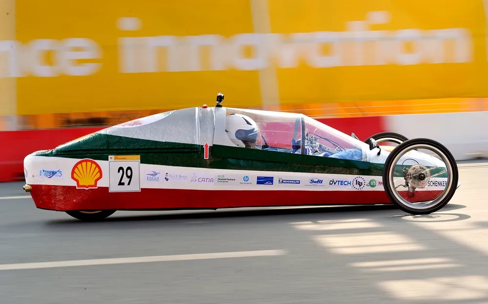 The SULONG, #29, a gasoline prototype vehicle from team Mandaragit at the New Era University in Quezon City, Philippines, runs on the track during day three of the Shell Eco-marathon Asia in Manila, Philippines, Saturday, March 5, 2016. (Jinggo Montenejo  via AP Images)