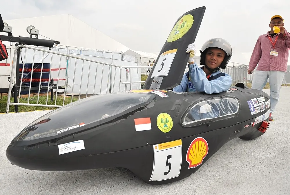 The SI PITUNG, #5, a gasoline prototype vehicle from Batavia Generation Team at the Universitas Negeri Jakarta in Jakarta Timur, Indonesia, gets set to enter the track during day two of the Shell Eco-marathon Asia, in Manila, Philippines, Friday, March 4, 2016. (Jinggo Montenejo/AP Images for Shell)