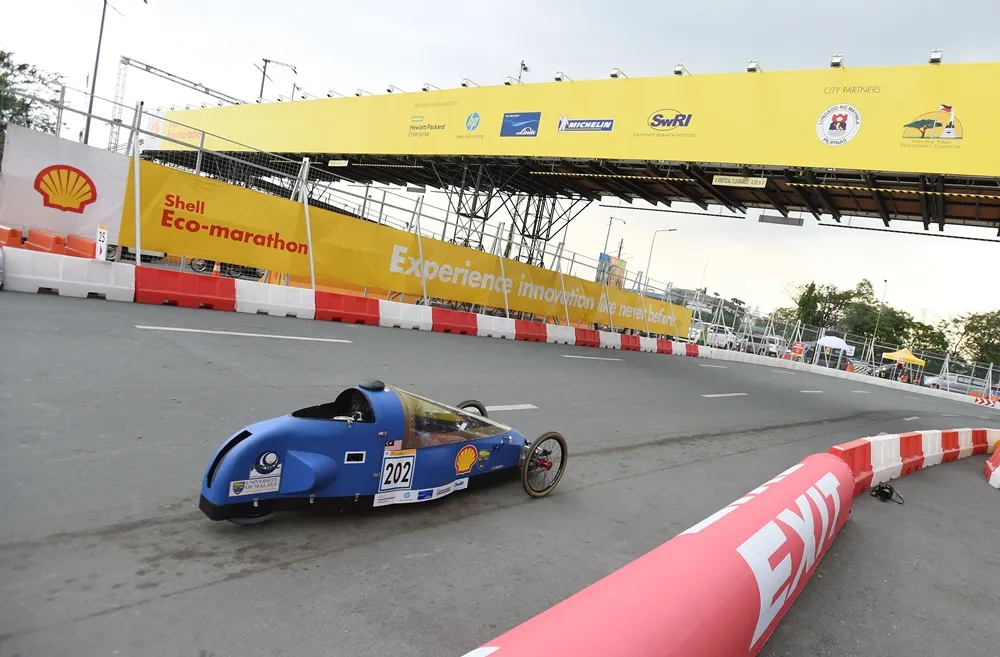 The Evora, #202, a hydrogen prototype vehicle from team Eco-Voyager at the University of Malaya in Bangsar, Malaysia, on the track during day one of the Shell Eco-marathon Asia, in Manila, Philippines, Thursday, March 3, 2016. (Jinggo Montenejo/AP Images for Shell)