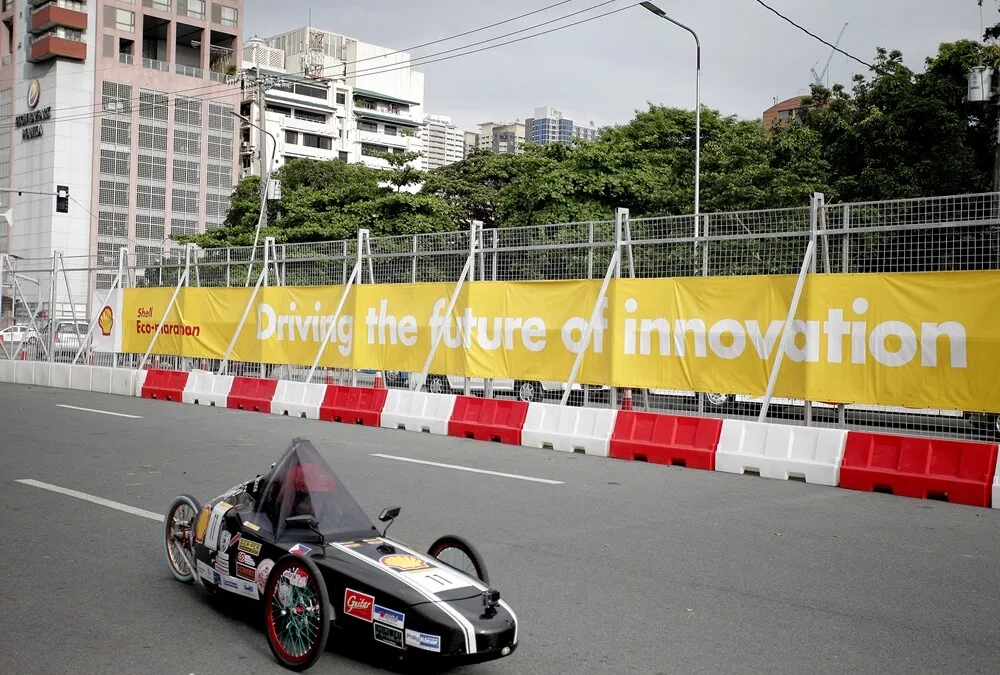 The Aguila III, #11, a gasoline prototype vehicle from team Aguila at the Mapua Institute of Technology in Manila, Philippines, runs on the track during day two of the Shell Eco-marathon Asia in Manila, Philippines, Friday, March 4, 2016. (Geloy Concepcion via AP Images)