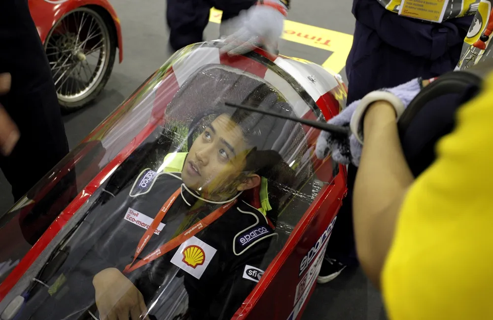 The Lualhati 2, #17, a gasoline prototype vehicle from team UE Manila Formula Juan 2016 at the University of the East in Manila, Philippines, goes through technical inspection during day two of the Shell Eco-marathon Asia in Manila, Philippines, Friday, March 4, 2016. (Geloy Concepcion via AP Images)