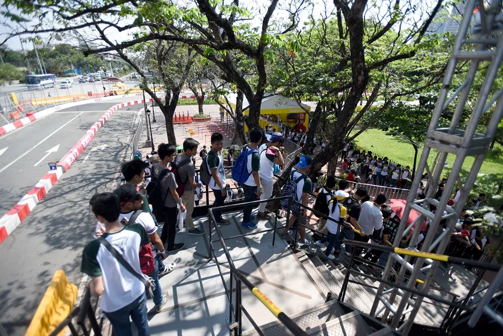 Visitors queue up at the entrance during day three of the Shell Eco-marathon Asia in Manila, Philippines, Saturday, March 5, 2016. (Jinggo Montenejo  via AP Images)