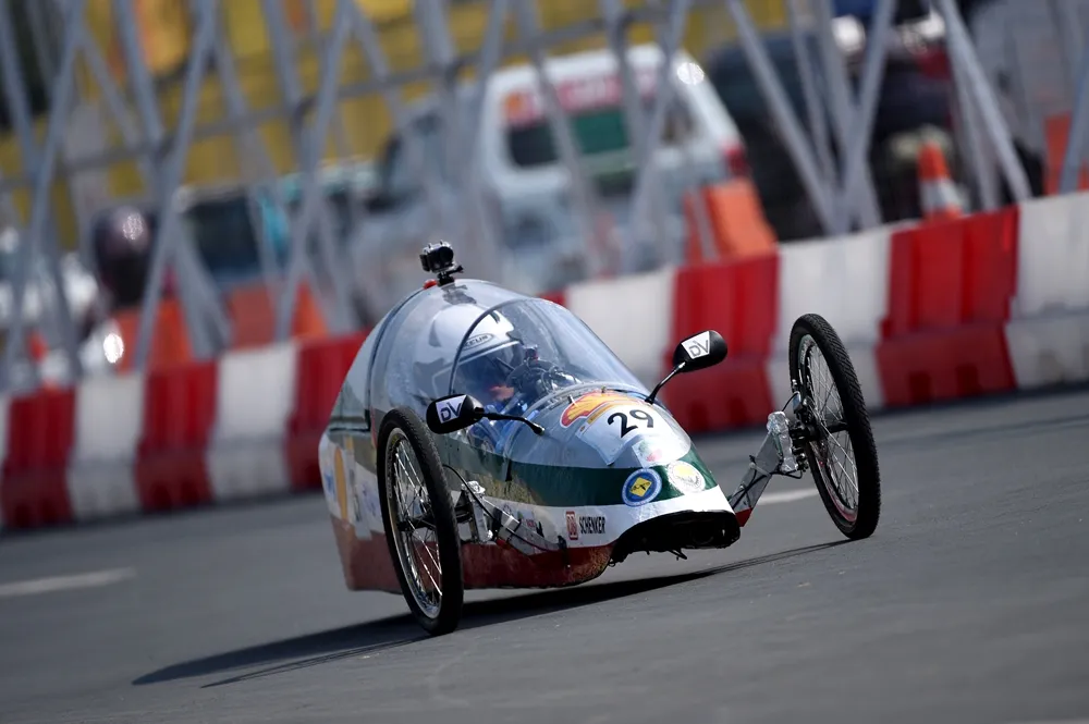 The SULONG, #29, a gasoline prototype vehicle from team Mandaragit at the New Era University in Quezon City, Philippines, runs on the track during day three of the Shell Eco-marathon Asia in Manila, Philippines, Saturday, March 5, 2016. (Jinggo Montenejo  via AP Images)