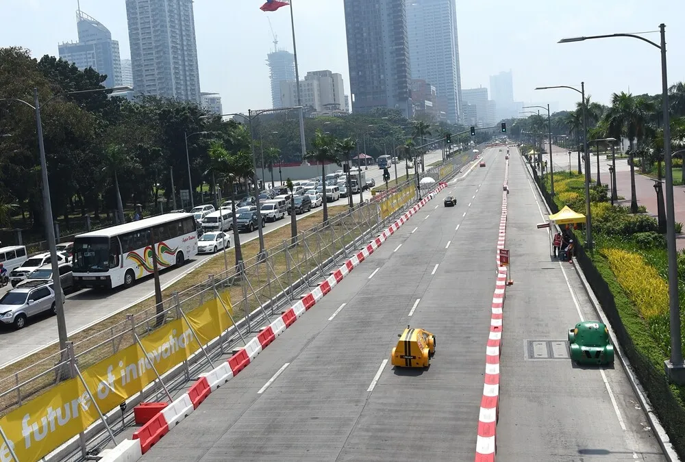 Competing cars run on the track during the final day of the Shell Eco-marathon Asia in Manila, Philippines, Sunday, March 6, 2016. (Jinggo Montenejo  via AP Images)
