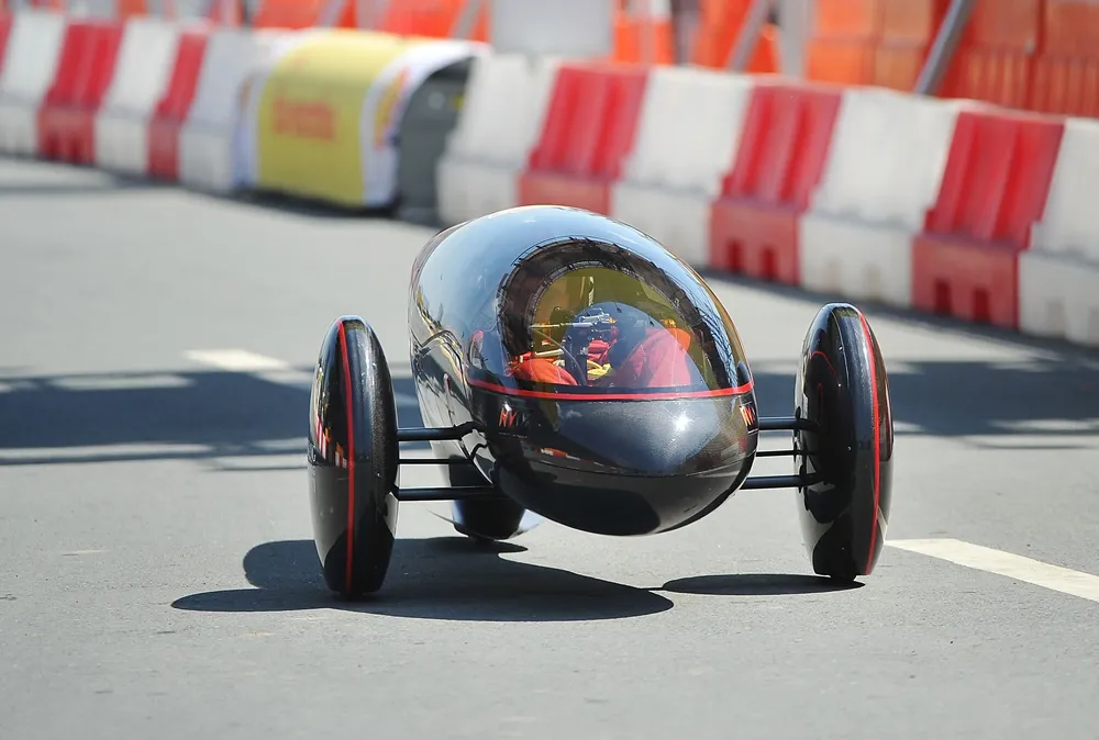 The Nanyang Venture IX, #305, a battery electric prototype vehicle from team Nanyang E Drive at the Nanyang Technological University in Singapore, Singapore, on the track during final day of the Shell Eco-marathon Asia, in Manila, Philippines, Sunday, March 6, 2016. (Geloy Concepcion/AP Images for Shell)