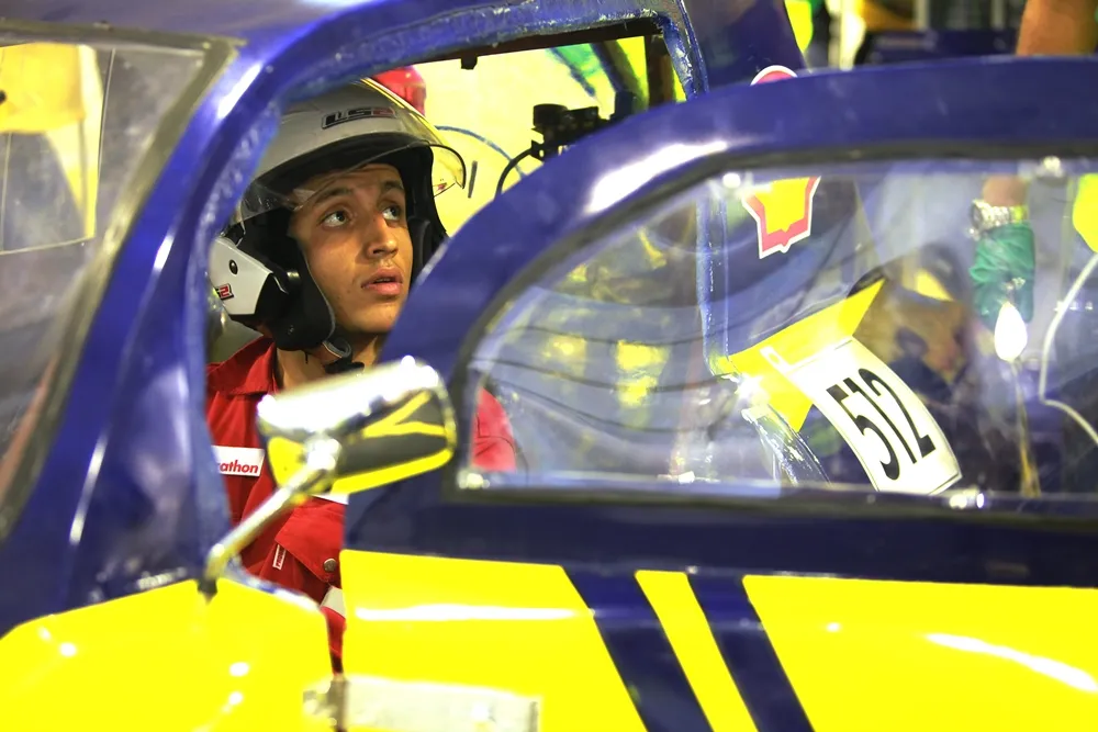 The driver of the Anubis II, #512, a gasoline UrbanConcept vehicle from team CUT Eco-Racing UC at the Cairo University Faculty of Engineering  in Giza, Egypt, guides his car through technical inspection during day one of the Shell Eco-marathon Asia in Manila, Philippines, Thursday, March 3, 2016. (Jake Verzosa/AP Images for Shell)
