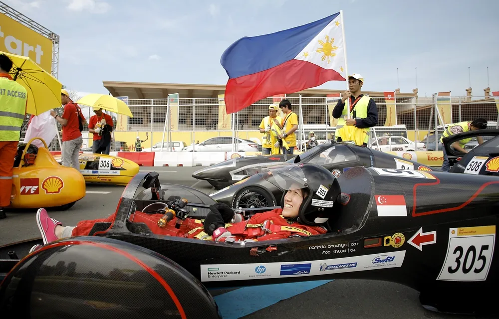 The Nanyang Venture IX, #305, a battery electric prototype vehicle from team Nanyang E Drive at the Nanyang Technological University in Singapore, Singapore, is seen on the starting line during day two of the Shell Eco-marathon Asia in Manila, Philippines, Friday, March 4, 2016. (Geloy Concepcion via AP Images)