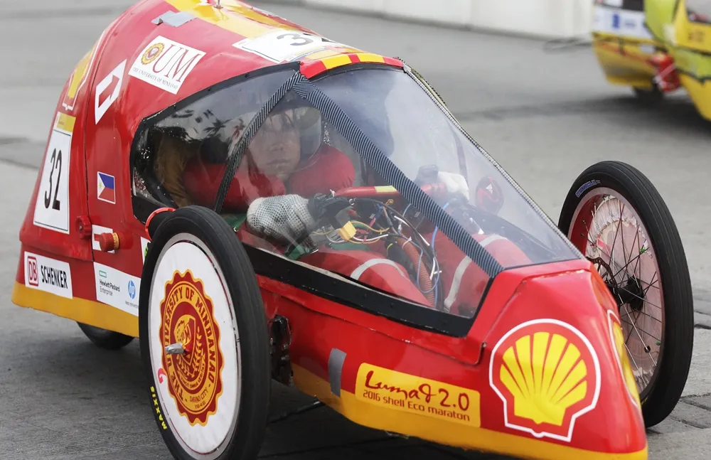 The LUMAD 2.0, #32, a gasoline prototype vehicle from Team UM at the University of Mindanao in Davao, Philippines, on the track during the final day of the Shell Eco-marathon Asia, in Manila, Philippines, Sunday, March 6, 2016. (Geloy Concepcion/AP Images for Shell)