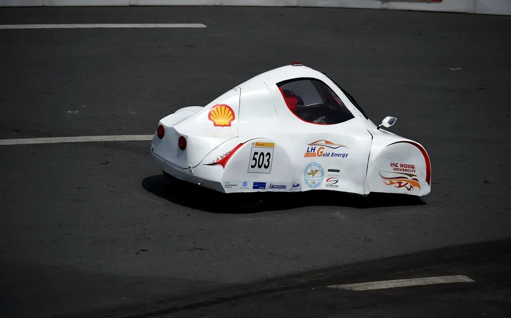 The LH Gold Energy, #503, a ethanol UrbanConcept vehicle from team LH - GOLD ENERGY at the Lac Hong University in Bien Hoa, Vietnam, completes a turn on the track during day three of the Shell Eco-marathon Asia in Manila, Philippines, Saturday, March 5, 2016. (Jinggo Montenejo  via AP Images)