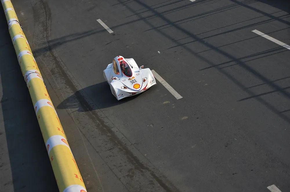 The LH Gold Energy, #503, a ethanol UrbanConcept vehicle from team LH - GOLD ENERGY at the Lac Hong University in Bien Hoa, Vietnam, runs on the track during day three of the Shell Eco-marathon Asia in Manila, Philippines, Saturday, March 5, 2016. (Jinggo Montenejo  via AP Images)