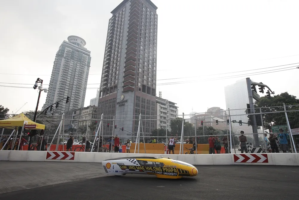The Luk Jao Mae Khlong Prapa Ethnol, #6, a ethanol prototype vehicle from team Luk Jao Mae Khlong Prapa Ethnol at the Dhurakij Pubdit University in Laksi, Thailand, on the track during the final day of the Shell Eco-marathon Asia, in Manila, Philippines, Sunday, March 6, 2016. (Geloy Concepcion/AP Images for Shell)