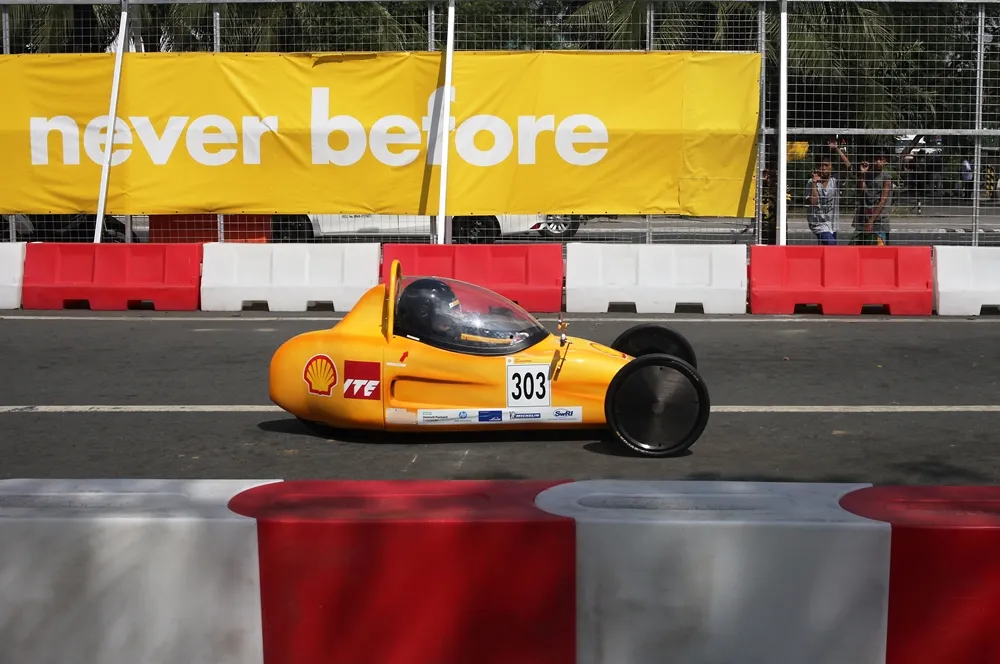 The EcoTraveller, #303, a battery electric prototype vehicle from team EcoTraveller at the Institute of Technical Education (ITE) in Singapore, on the track during day three of the Shell Eco-marathon Asia, in Manila, Philippines, Saturday, March 5, 2016. (Nacho Hernandez for Shell via AP Images)