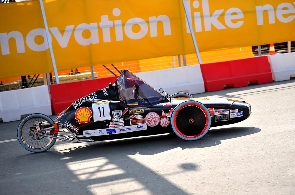 The Aguila III, #11, a gasoline prototype vehicle from team Aguila at the Mapua Institute of Technology in Manila, Philippines, runs on the track during day three of the Shell Eco-marathon Asia in Manila, Philippines, Saturday, March 5, 2016. (Jinggo Montenejo  via AP Images)