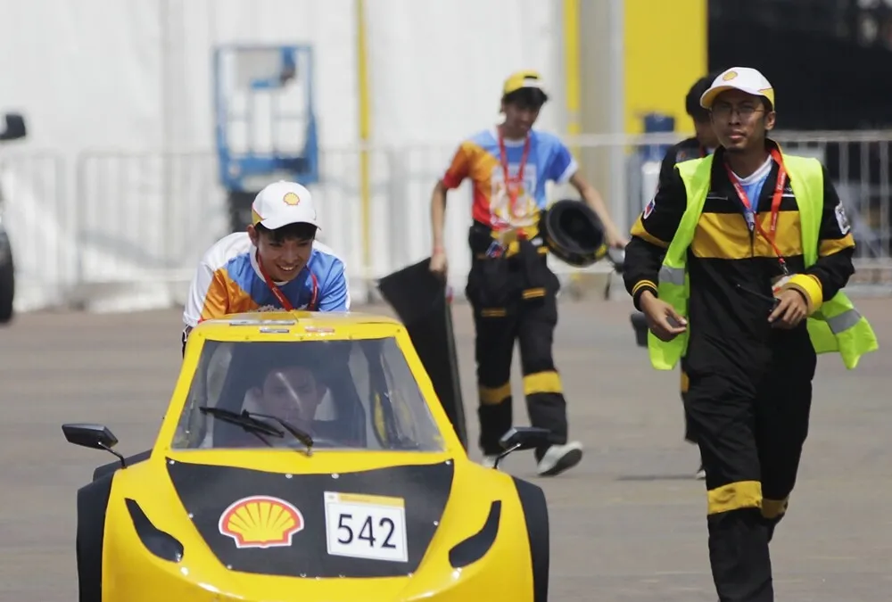 The Apex, #542, a diesel UrbanConcept vehicle from team TIP Mileage Proto at the Technological Institute of the Philippines, Manila in Manila, Philippines, prepares to enter the track during final day of the Shell Eco-marathon Asia, in Manila, Philippines, Sunday, March 6, 2016. (Geloy Concepcion/AP Images for Shell)
