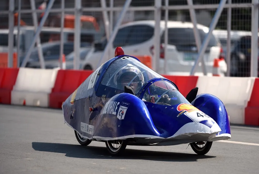The BLUE WHALE, #48, a gasoline prototype vehicle from team CKC BLUE WHALE at the HCMC Cao Thang Technical College in Ho Chi Minh, Vietnam, runs on the track during day three of the Shell Eco-marathon Asia in Manila, Philippines, Saturday, March 5, 2016. (Jinggo Montenejo  via AP Images)