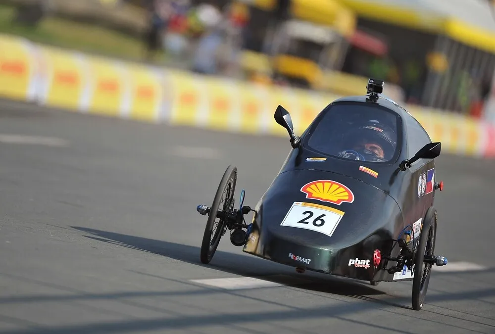 The Ignite v2.0, #26, a gasoline prototype vehicle from team Blue Knights 1 at the Ateneo de Davao University in Davao City, Philippines, runs on the track during day three of the Shell Eco-marathon Asia in Manila, Philippines, Saturday, March 5, 2016. (Jinggo Montenejo  via AP Images)