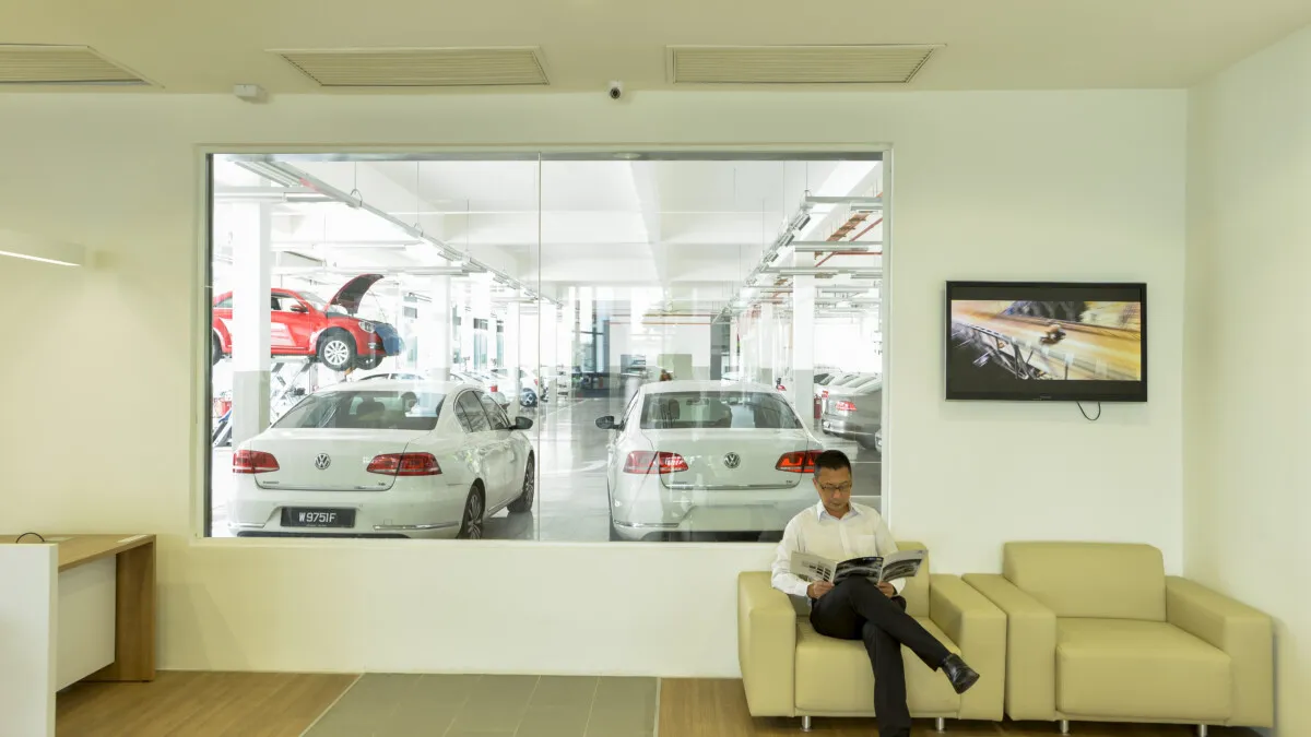 Customer lounge where customers can watch their cars being worked on