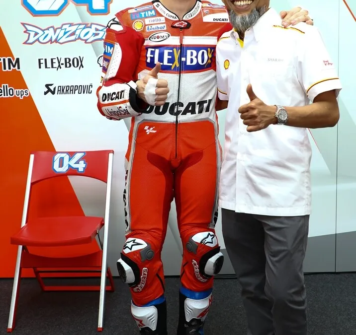 Shell Malaysia MD Shairan Huzani Husain with Ducati rider Andrea Dovizio...