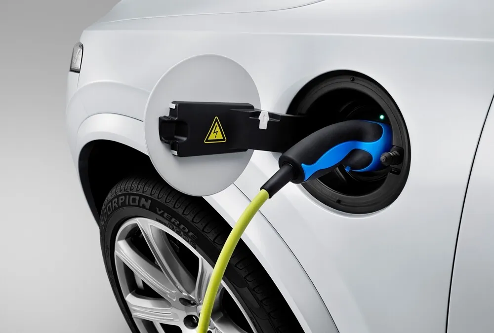 The connector for the all-new Volvo XC90 Twin Engine charge cable is located above the left front wheel arch.
