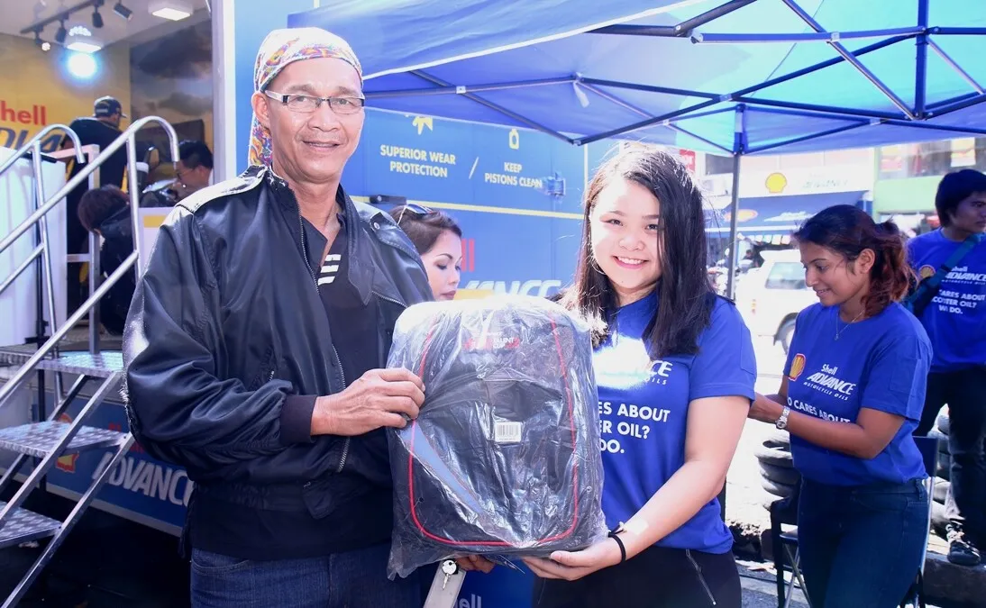 A lucky biker won a backpack at the Shell Advance Roadshow